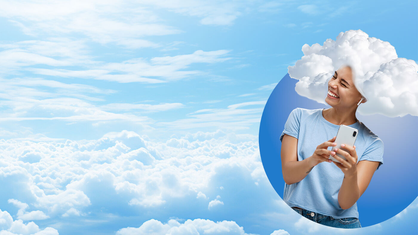 Professional with a phone framed by a circle of clouds